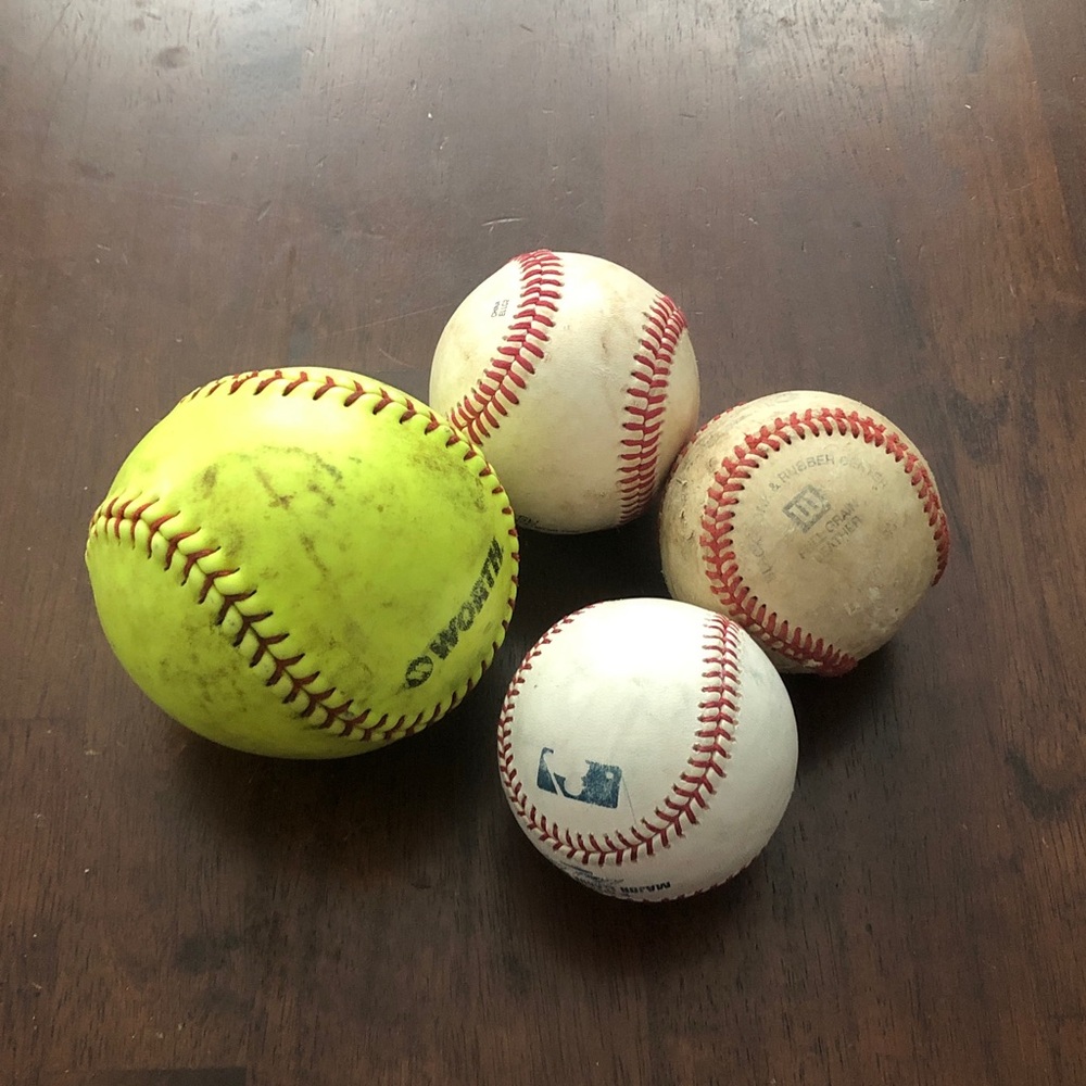Wilson Yellow Softball and White Baseballs Set with Red Stitching